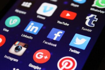 Social media app icons displayed on a smartphone screen