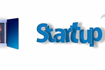 Laptop with startup text and rocket icon, symbolizing launching an affiliate business.