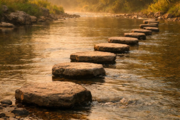 Stepping stones across a calm river representing gradual progress and a step by step approach to affiliate marketing